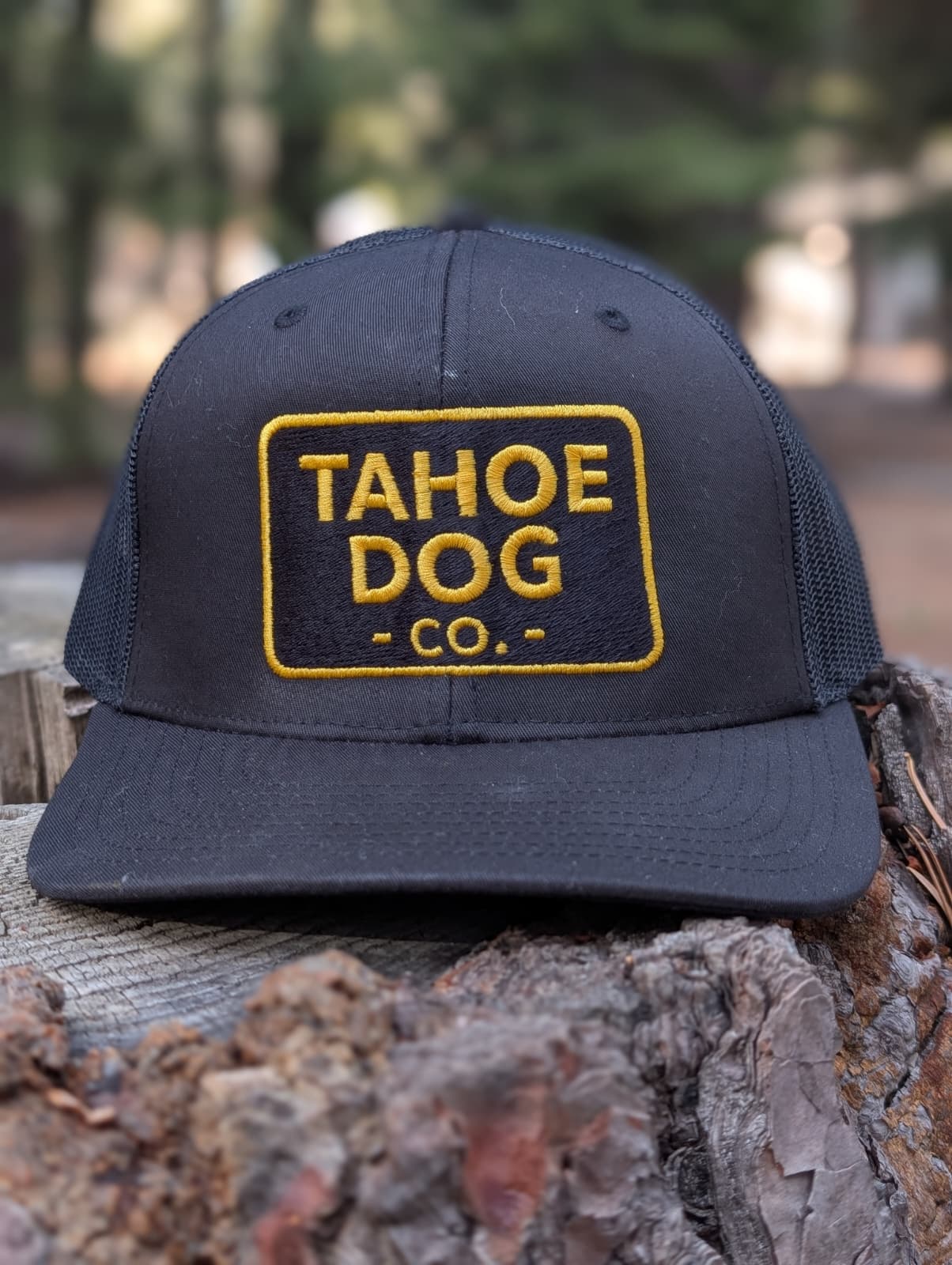 Black trucker hat featuring Tahoe Dog Co. logo (new as of 12/5/25!)